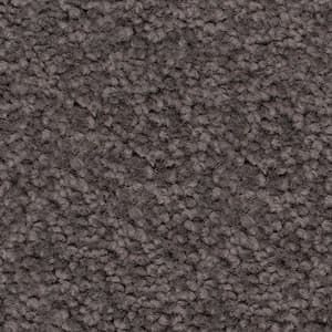 A close up of a gray carpet texture.