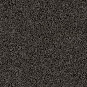 A close up of a gray carpet texture.