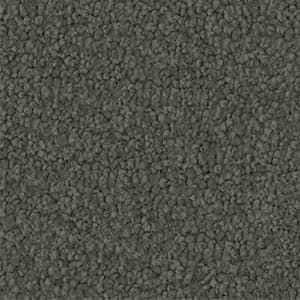 A close up of a gray carpet texture.