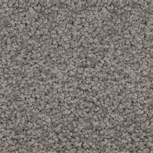 A close up of a gray carpet texture.