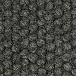 A close up of a gray carpet texture.