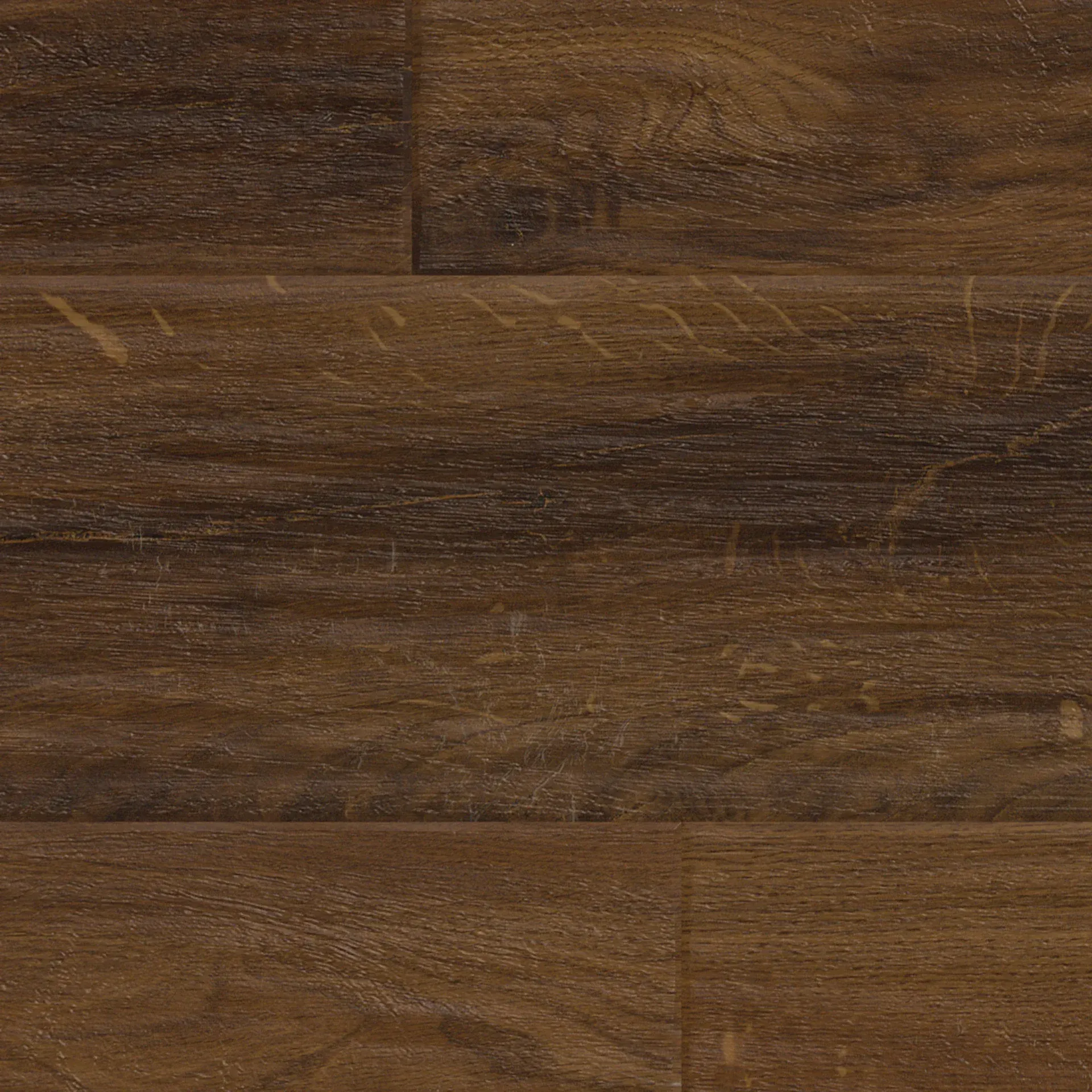 A close up of a brown wooden floor.