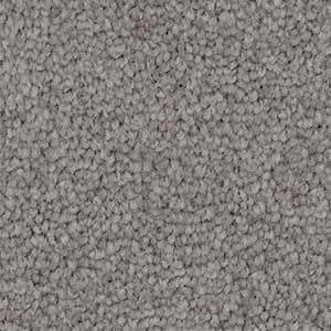 A close up of a gray carpet texture.
