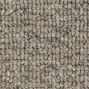 A close up of a gray carpet with a knitted pattern.