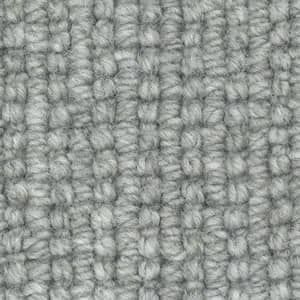 A close up of a gray carpet texture.