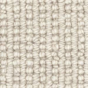 A close up of a white carpet texture.