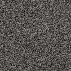 A close up of a gray carpet texture.