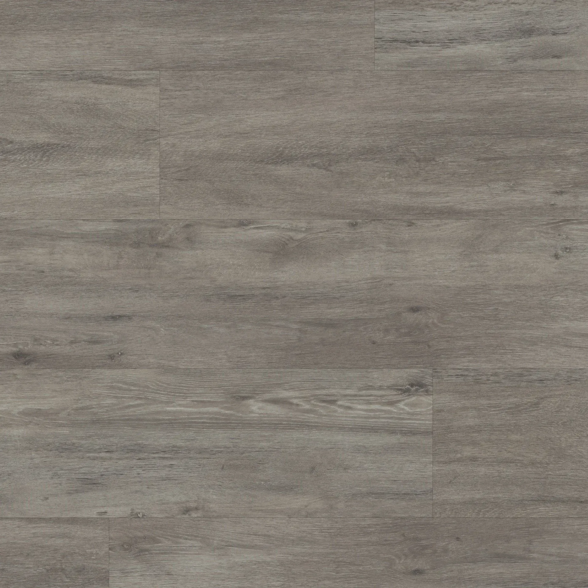 A close up of a gray vinyl floor that looks like wood.