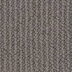 A close up of a gray carpet texture.