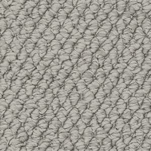 A close up of a gray carpet texture.