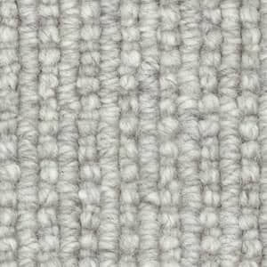 A close up of a gray carpet texture.