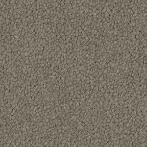 A close up of a gray carpet texture.