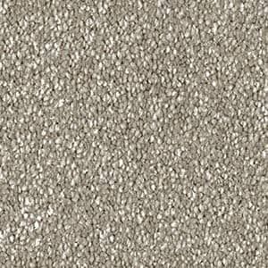 A close up of a gray carpet texture.