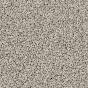 A close up of a grey carpet texture.