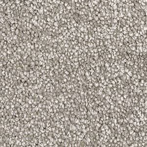 A close up of a carpet with a lot of small dots on it.