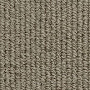 A close up of a gray carpet texture.