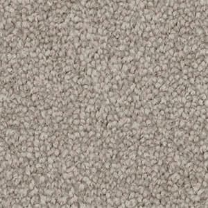 A close up of a grey carpet texture.