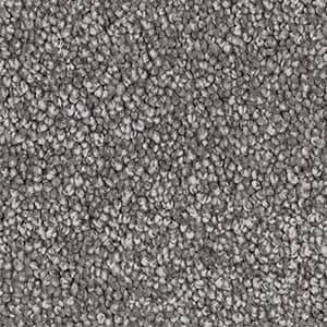 A close up of a gray carpet texture.