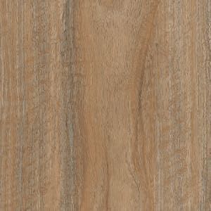 A close up of a piece of wood showing the grain and texture.