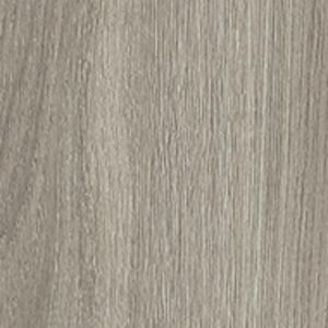 A close up of a piece of wood showing the grain and texture.