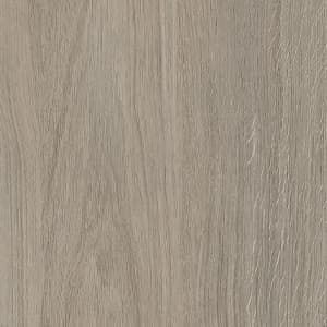 A close up of a piece of wood showing the texture of the wood.