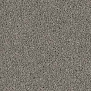 A close up of a gray carpet texture.