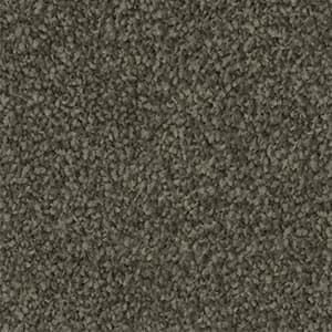 A close up of a gray carpet texture.