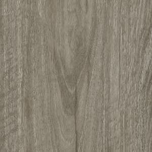 A close up of a piece of wood showing the texture of the wood.