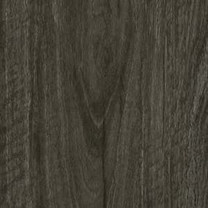 A close up of a piece of wood showing the texture of the wood.