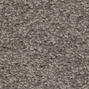 A close up of a gray carpet texture.