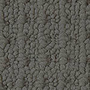 A close up of a gray carpet texture.