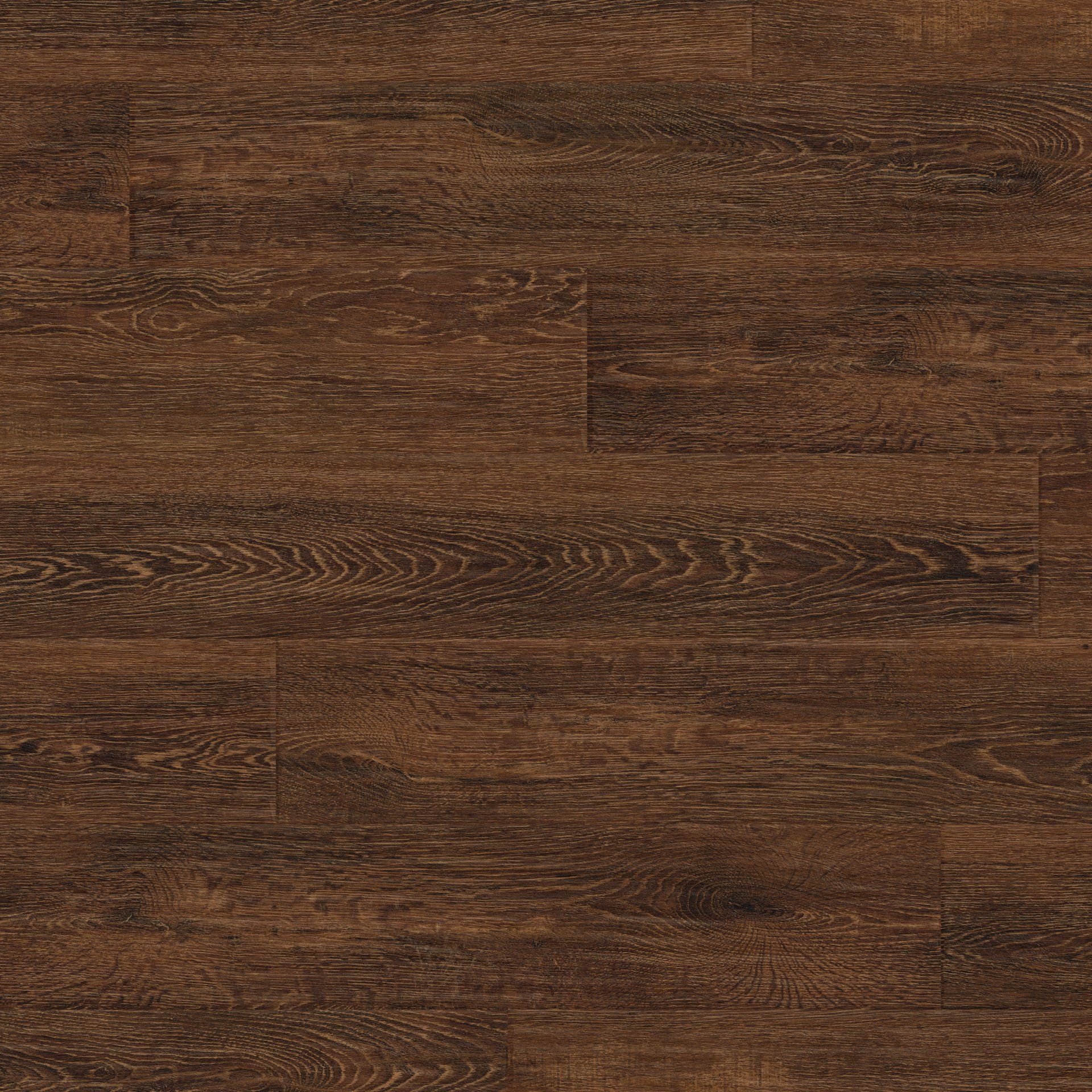 A close up of a brown wooden floor.