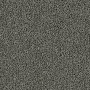 A close up of a gray carpet texture.