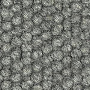 A close up of a gray carpet texture.