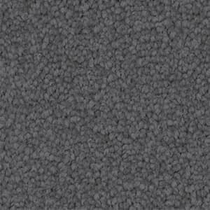 A close up of a gray carpet texture.