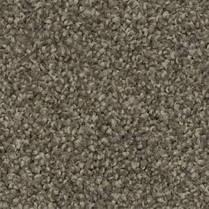 A close up of a carpet with a lot of small dots on it.