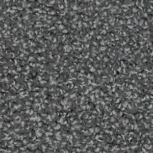 A close up of a gray carpet texture.
