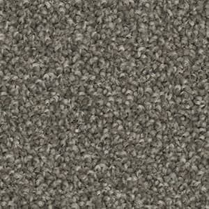 A close up of a gray carpet texture.