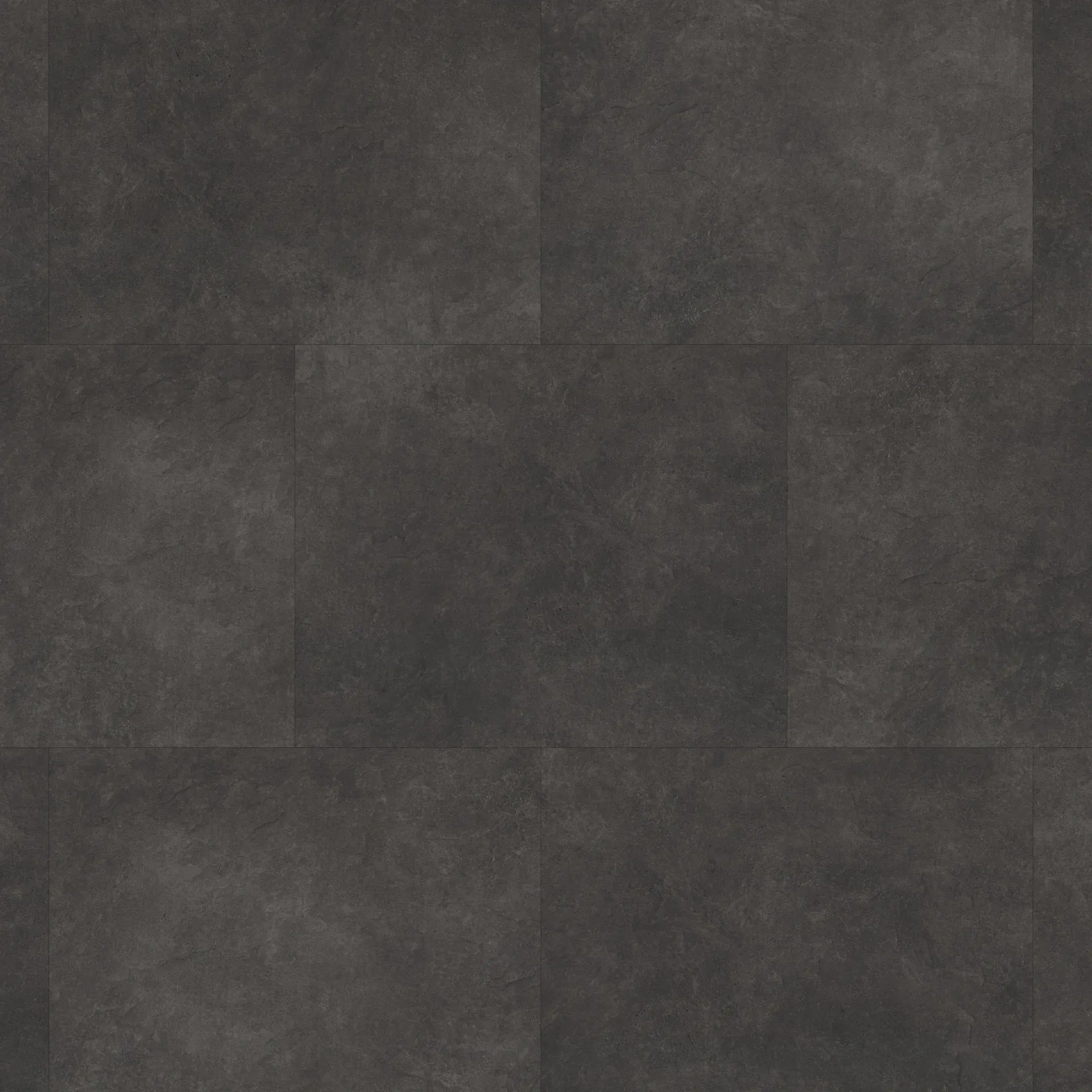 A close up of a black tile floor.
