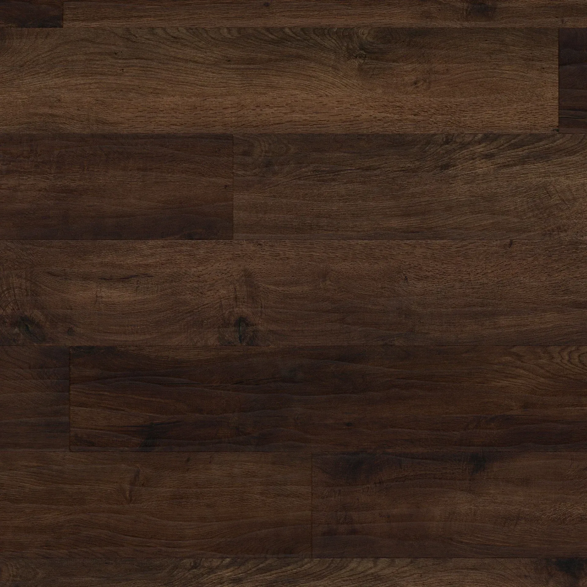 A close up of a dark brown wooden floor.