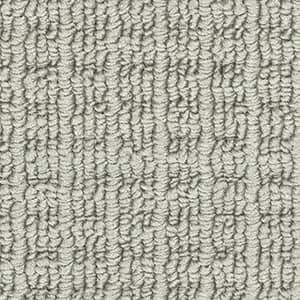 A close up of a gray carpet texture.