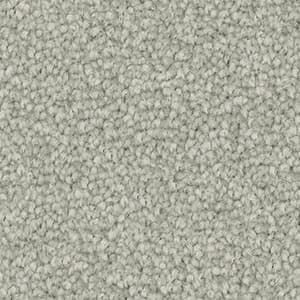 A close up of a carpet with a lot of small dots on it.