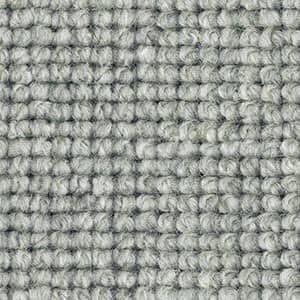 A close up of a gray carpet texture.