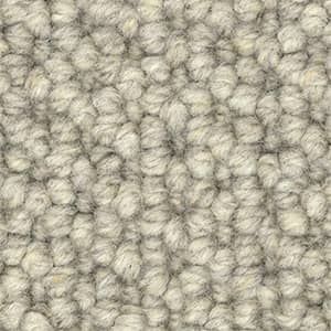 A close up of a white carpet texture.