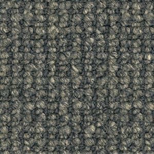 A close up of a gray carpet texture.