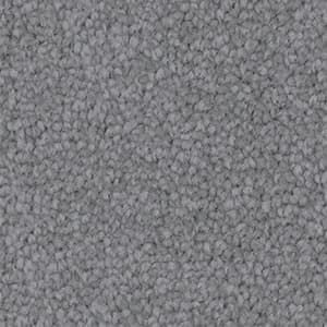 A close up of a gray carpet texture.