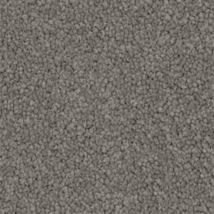 A close up of a gray carpet texture.