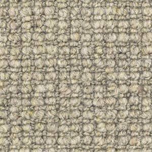 A close up of a carpet with a pattern on it.