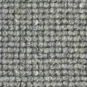 A close up of a gray carpet texture.