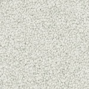 A close up of a white carpet texture.